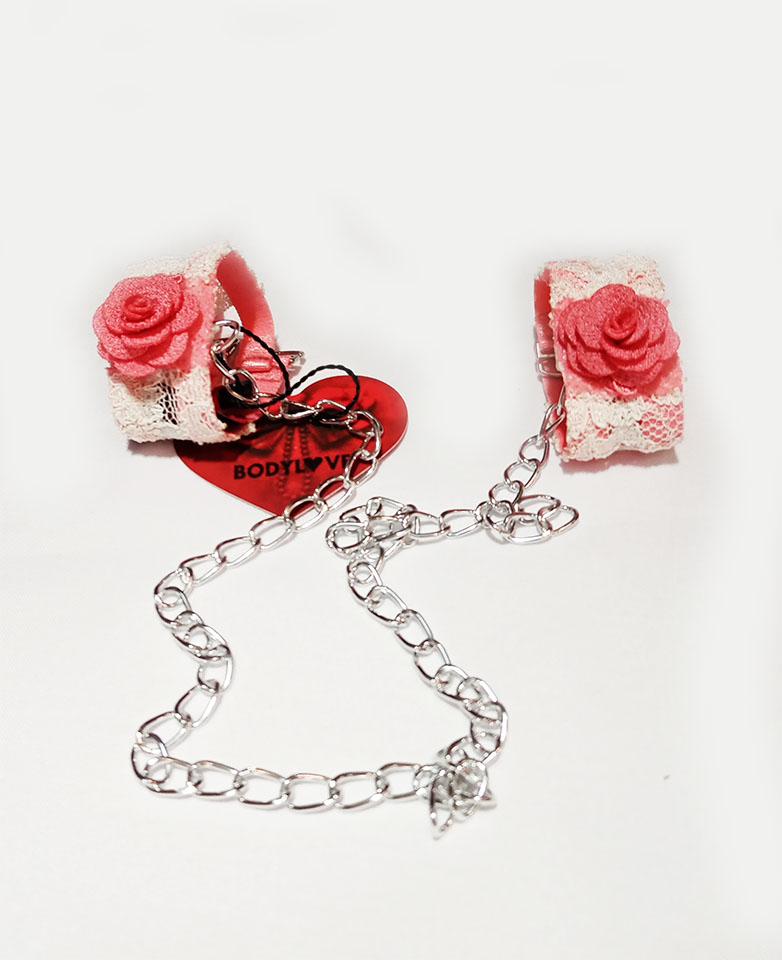 Menottes dentelle corail